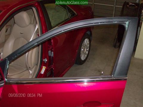 Cadillac CTS 2010 Front Door Replacement Looking at the Broken Glass