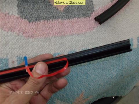 Acura MDX 2006-Pulling Adhesive Red Tape Cover on Molding