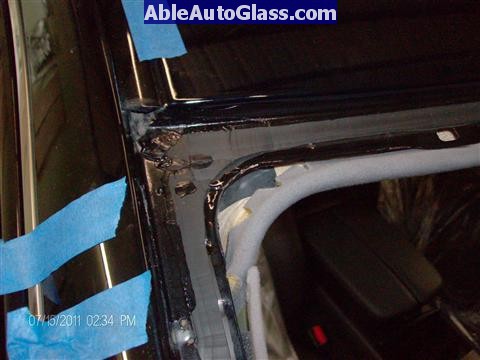Acura RL 2005-2008 Windshield Replaced - close-up of primed pinchweld