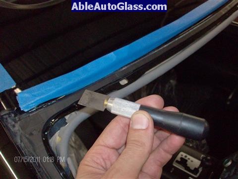Acura RL 2005-2008 Windshield Replaced - stubby knife