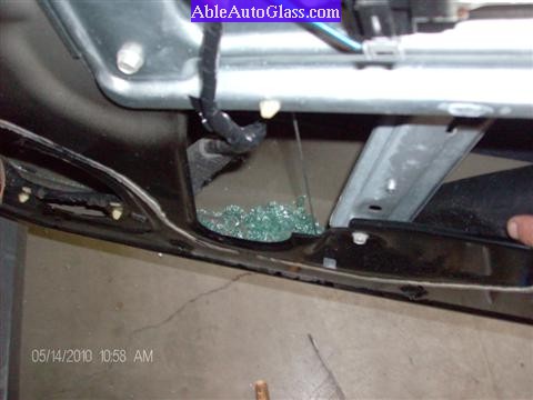 Chevy Equinox 2005-2009 Front Door Auto Glass Replacement - View of Broken Glass
