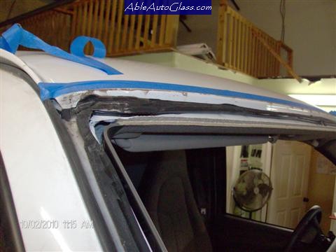Chevy Express Van 2005-2011 Windshield Replacement-Notice Brown Dirt
