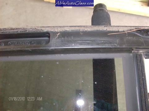 Ford-F150-1997-2004-Back-Auto-Glass-Reseal The old Seal Separated Causing Water Leak
