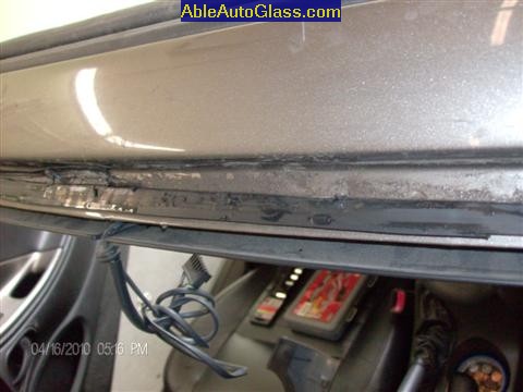 Ford Saleen Mustang Convertible 2002 Windshield Replacement - View of Old Seal and Dirty Pinchweld at Top