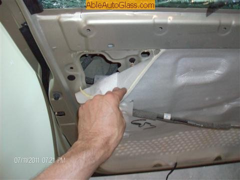 Infinit QX56 2008 Front Left Door Glass Laminated - removing weather barrier