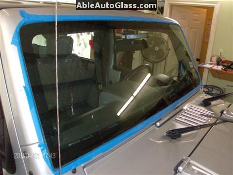 Jeep Wrangler 2009 Windshield Replacement OEM Mopar  - Used Blue Tape