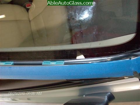 Lexus IS250 2010 Windshield Replacement - blue clips lower right