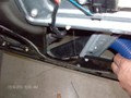Chevy Equinox 2005-2009 Front Door Auto Glass Replacement - Vacuuming Broken Glass inside Door