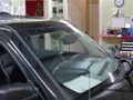 Jeep Patriot 2007-2011 Windshield - Replacement - View of Paper Under Bug (